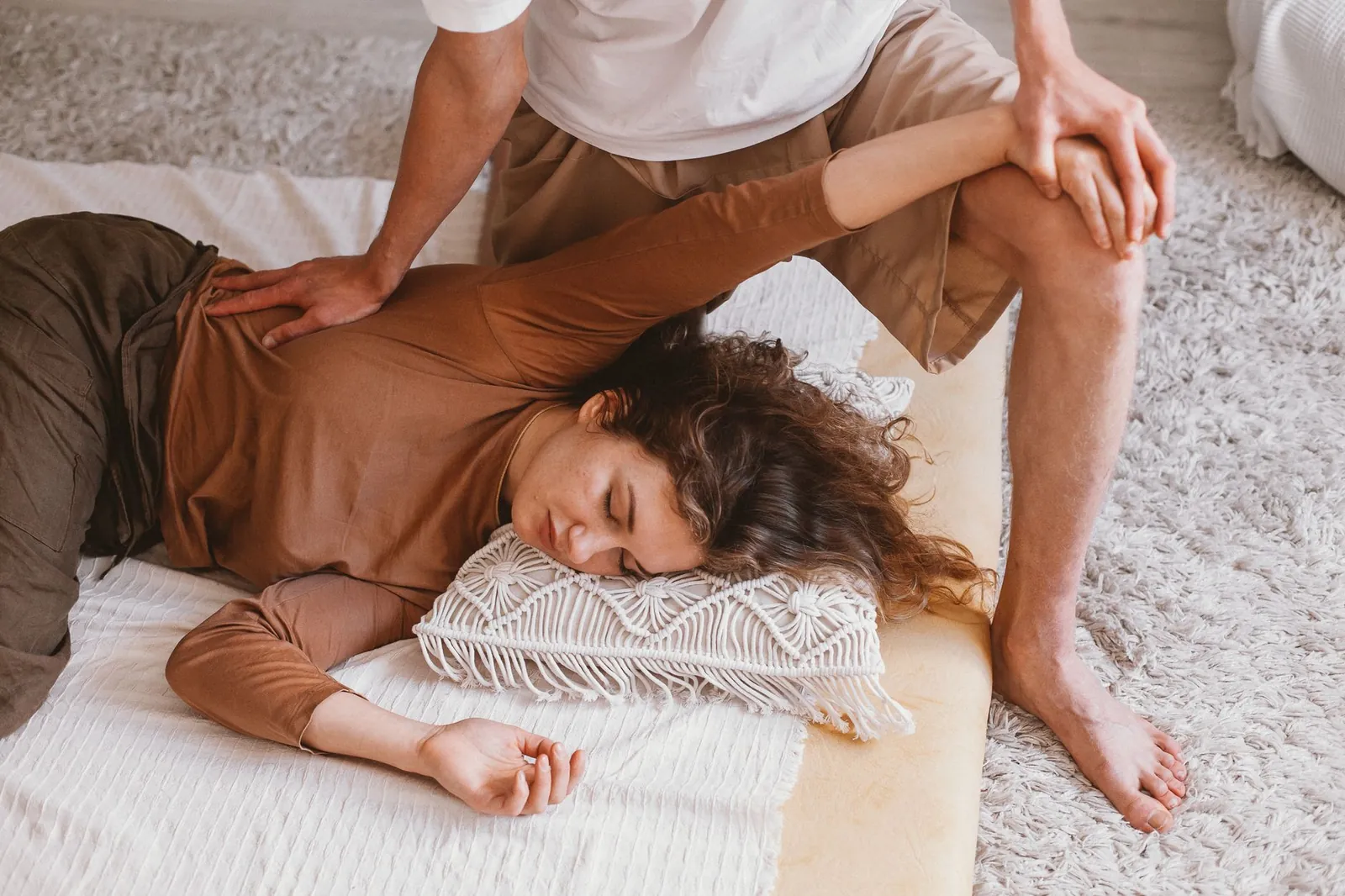 Professional movers carefully handling furniture during delivery service